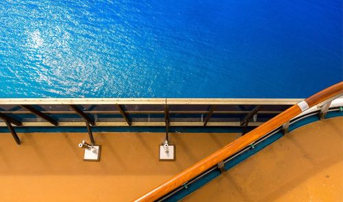 Swimming pool against blue sea