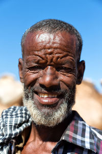 Close-up portrait of a man smiling