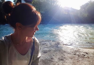 Woman on beach during sunny day