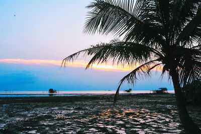 Scenic view of sea against sky at sunset