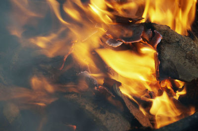 Close-up of bonfire on fire at night