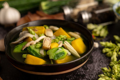 High angle view of chopped vegetables in bowl on table