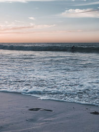 Scenic view of sea against sky during sunset