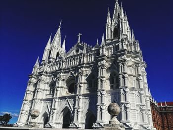 Low angle view of statue of temple against clear sky