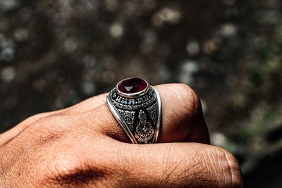 Close-up of person wearing ring