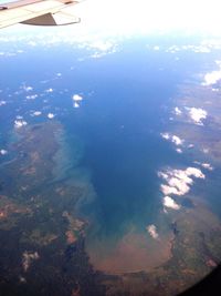 Cropped image of airplane over landscape