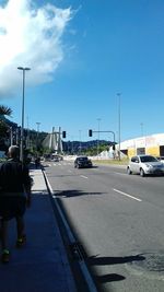 View of street against blue sky