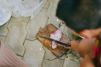 High angle view of woman hand painting