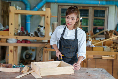 Portrait of man working at workshop