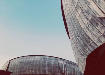 Low angle view of modern building against sky