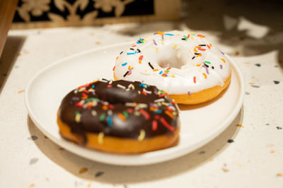 Close-up of donuts on table