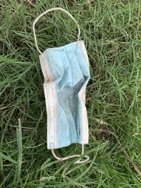 High angle view of shoes hanging on land