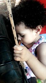 High angle view of cute girl looking down