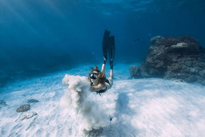 High angle view of man swimming in sea