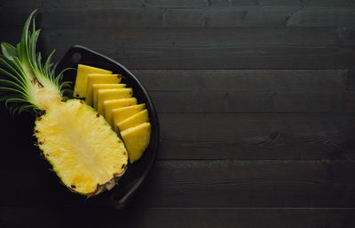 High angle view of yellow fruit on table