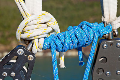 Close-up of rope tied on metal