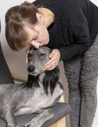 Portrait of woman with dog