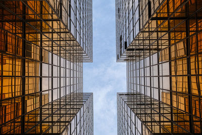 Low angle view of modern buildings against sky