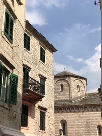 Low angle view of old building against sky