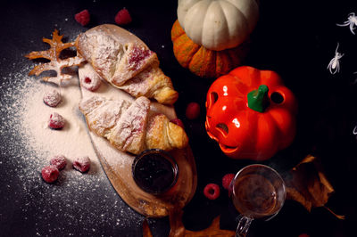 High angle view of jack o lantern on table