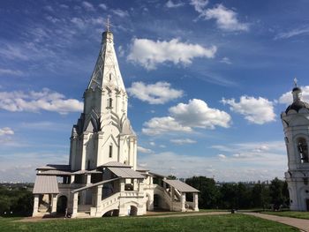 View of temple against building