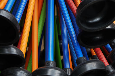 Close-up of multi colored plungers