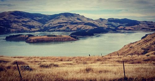 View of lake with mountain range in background