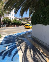 Shadow of people on street