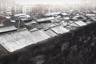 High angle view of houses in city