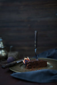 Close-up of chocolate cake in plate on table