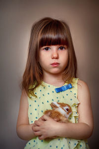 Portrait of a girl over white background
