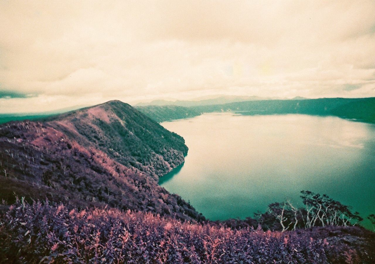 SCENIC VIEW OF MOUNTAIN RANGE AGAINST SKY