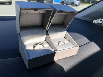 High angle view of wedding rings on table