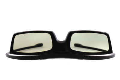 Close-up of sunglasses against white background