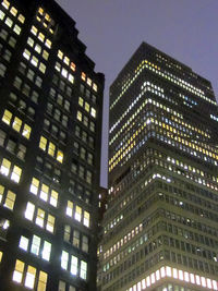 Low angle view of modern building at night