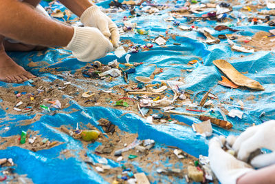 Close-up of people cleaning