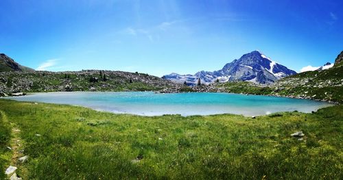 Scenic view of lake against mountain range