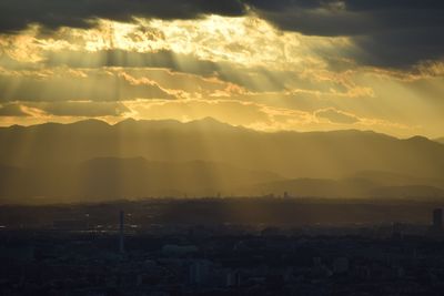 Aerial view of townscape against sky during sunset