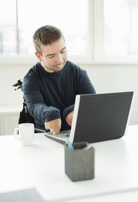 Man working on table