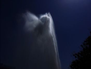 Low angle view of smoke against sky