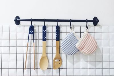 Kitchen utensils hanging on wall