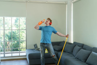 Full length of boy standing at home