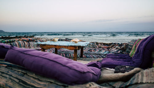 Scenic view of beach against sky during sunset