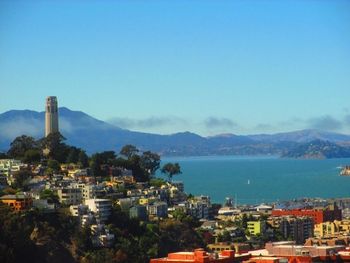 Cityscape with mountain range in background