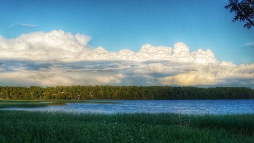 View of lake against cloudy sky