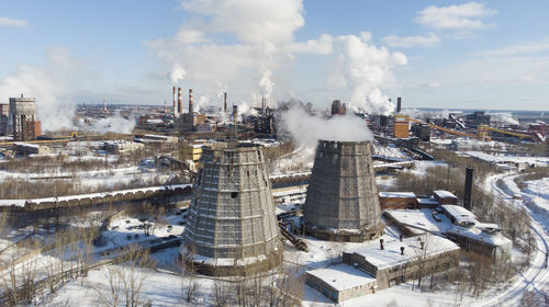 High angle view of cityscape against sky during winter