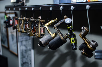 Close-up of padlocks on railing