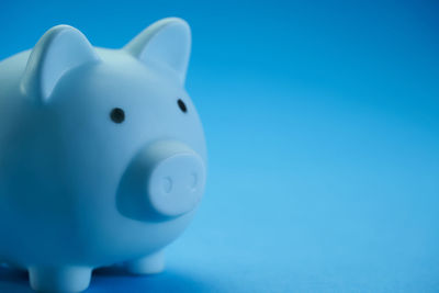 Close-up of a toy against blue background