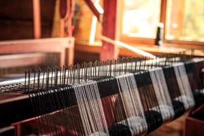 Close-up of handloom at textile industry