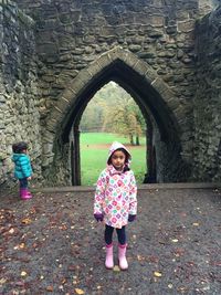 Full length of girl standing in park